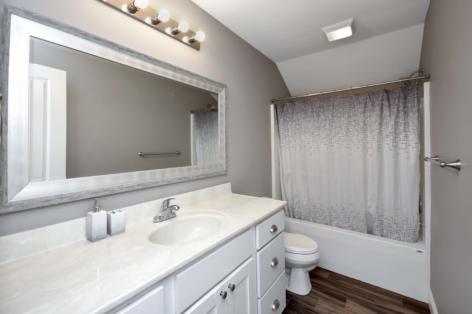 3638 Napa Lane Normal, IL 61761 - Photo 35 of 53 a bathroom with a granite countertop sink toilet a large mirror and shower