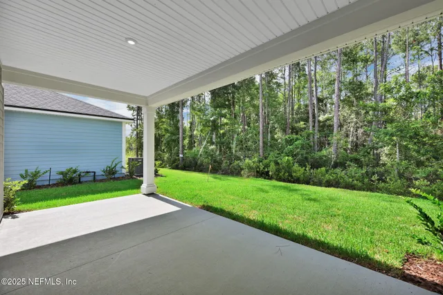 a view of a backyard of a house