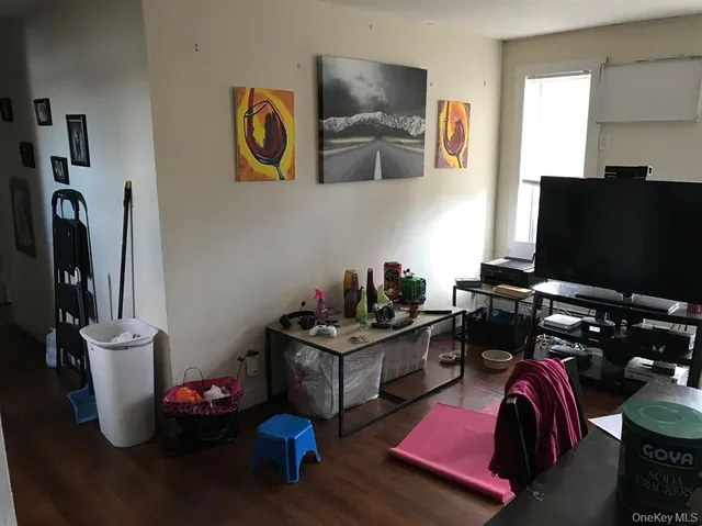 a workspace with furniture and ceiling fan