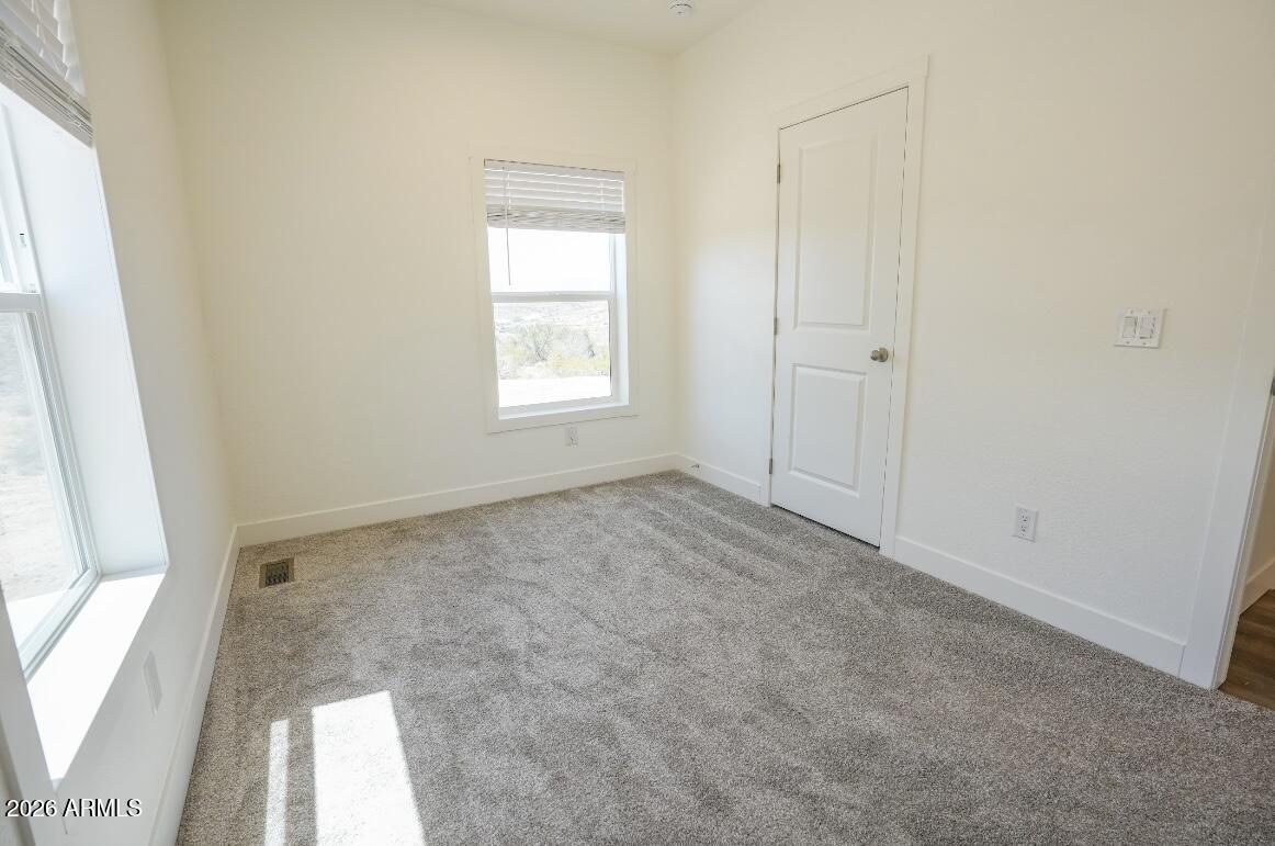 4710 Lazy Lariat Lane Rimrock, AZ 86335 - Photo 16 of 19 an empty room with a window