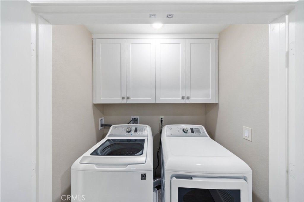 143 Bowery Irvine, CA 92612 - Photo 23 of 32 a utility room with dryer and washer