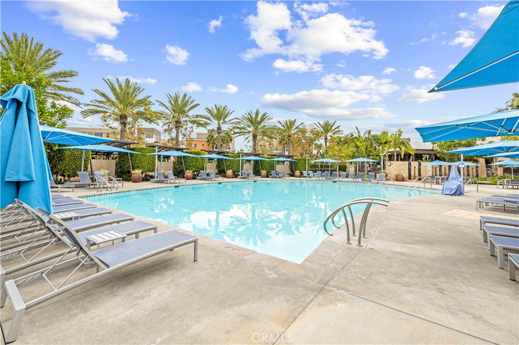 143 Bowery Irvine, CA 92612 - Photo 28 of 32 a swimming pool with outdoor seating and yard