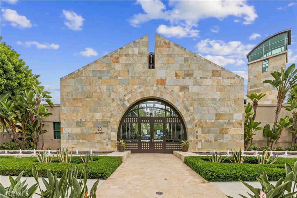 143 Bowery Irvine, CA 92612 - Photo 31 of 32 a view of a garden with a fountain