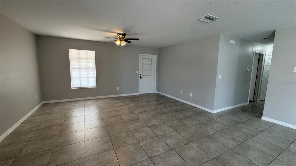 4318 Mongite Road North Port, FL 34287 - Photo 2 of 18 a view of an empty room with a window