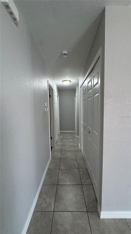 4318 Mongite Road North Port, FL 34287 - Photo 8 of 18 a view of hallway with a bathroom