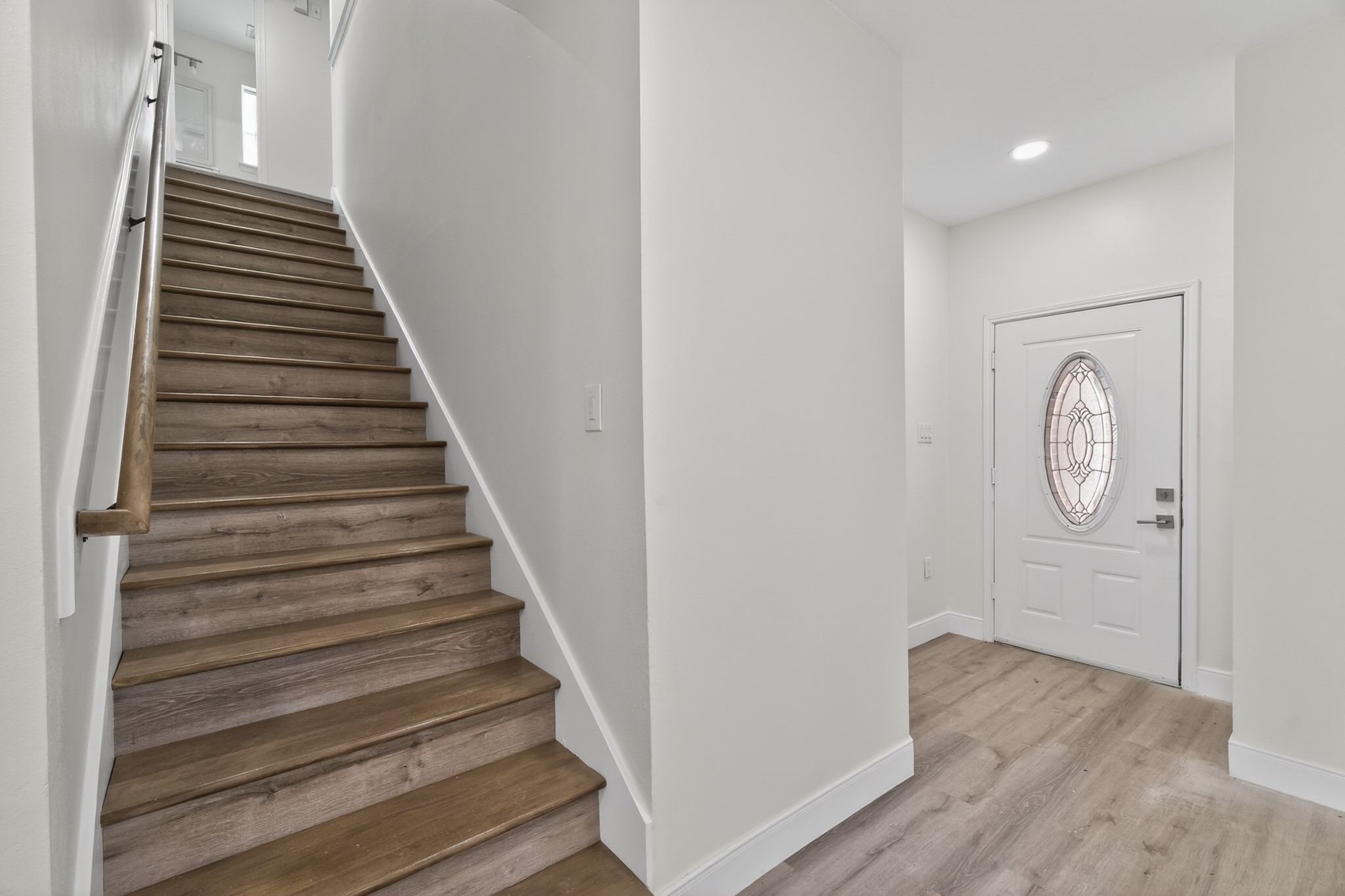 918 Ivycroft Lane Spring, TX 77373 - Photo 17 of 33 a view of a hallway with wooden floor