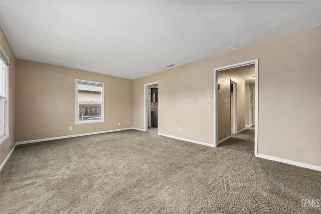 an empty room with a natural light