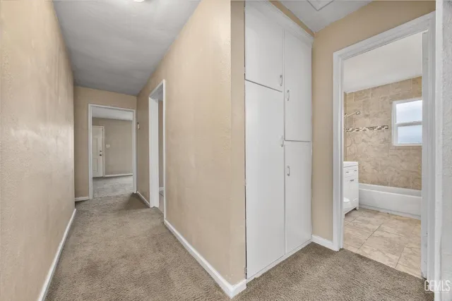 a view of a bathroom with a glass door