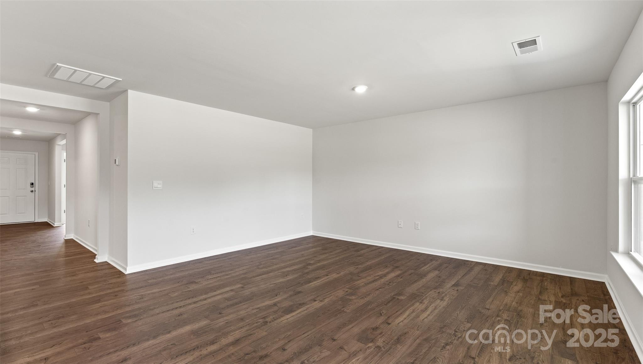 212 Callie River Clyde, NC 28721 - Photo 12 of 25 wooden floor in an empty room