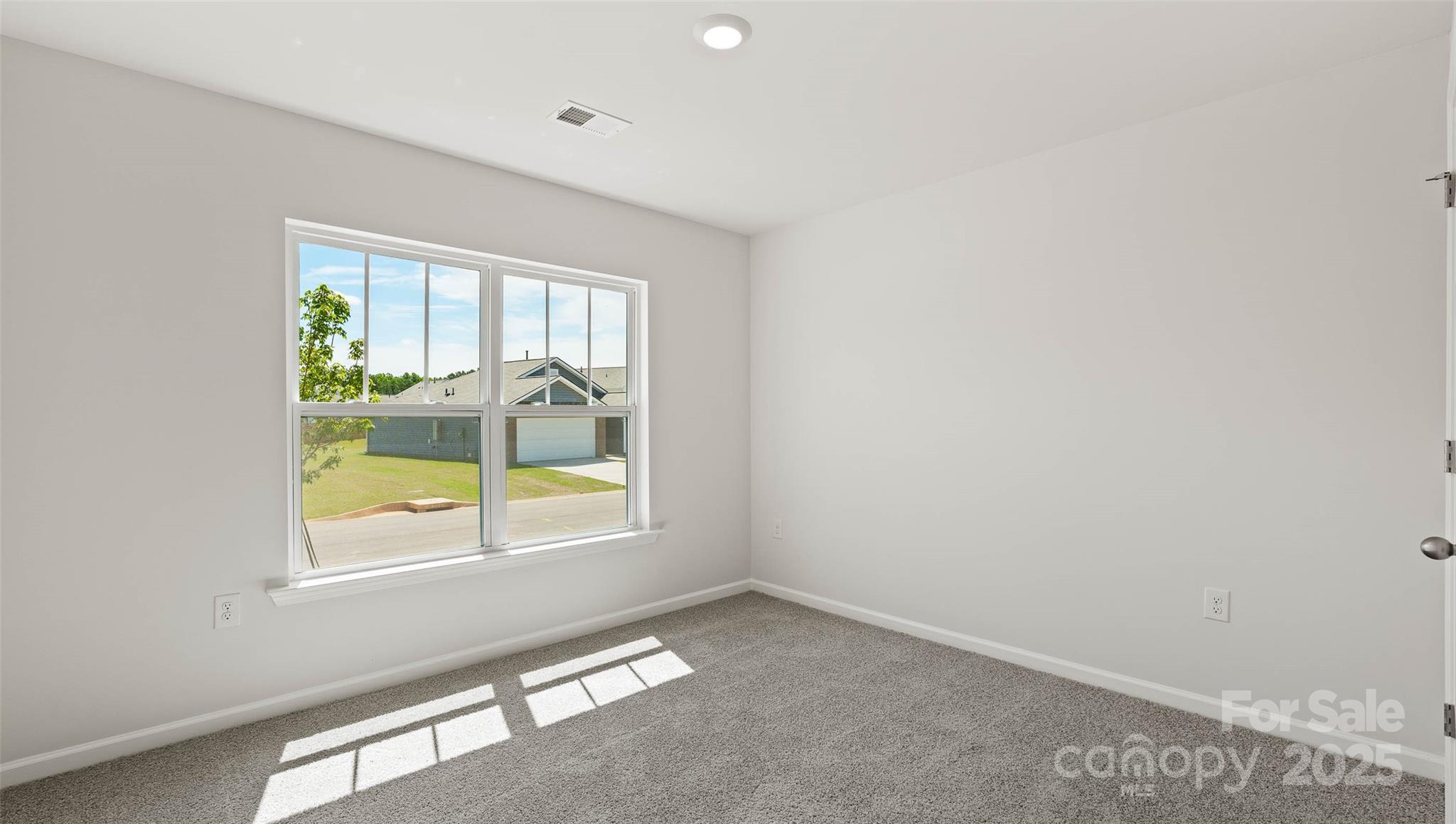212 Callie River Clyde, NC 28721 - Photo 13 of 25 a view of an empty room with a window