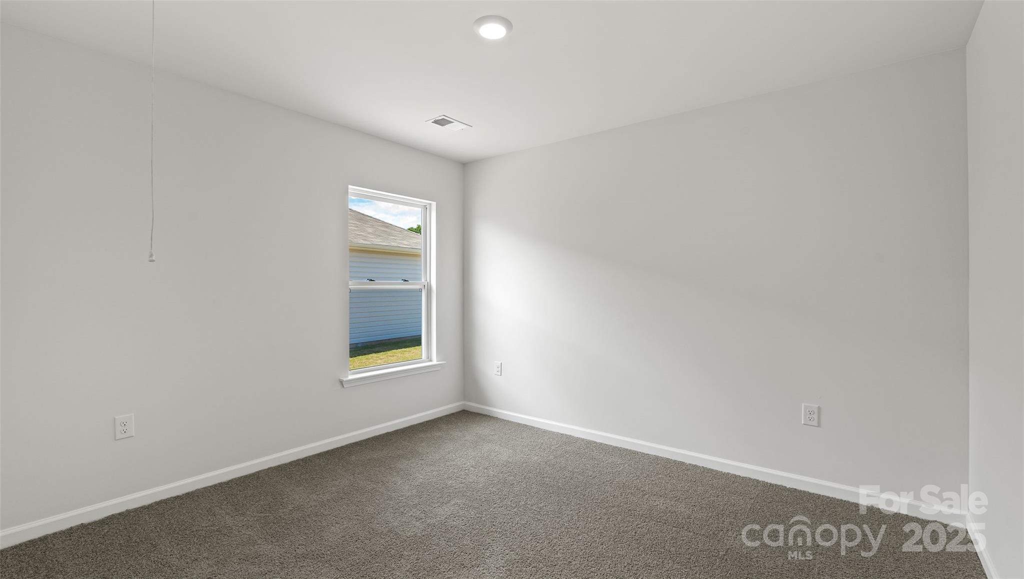 212 Callie River Clyde, NC 28721 - Photo 14 of 25 a view of an empty room with a window