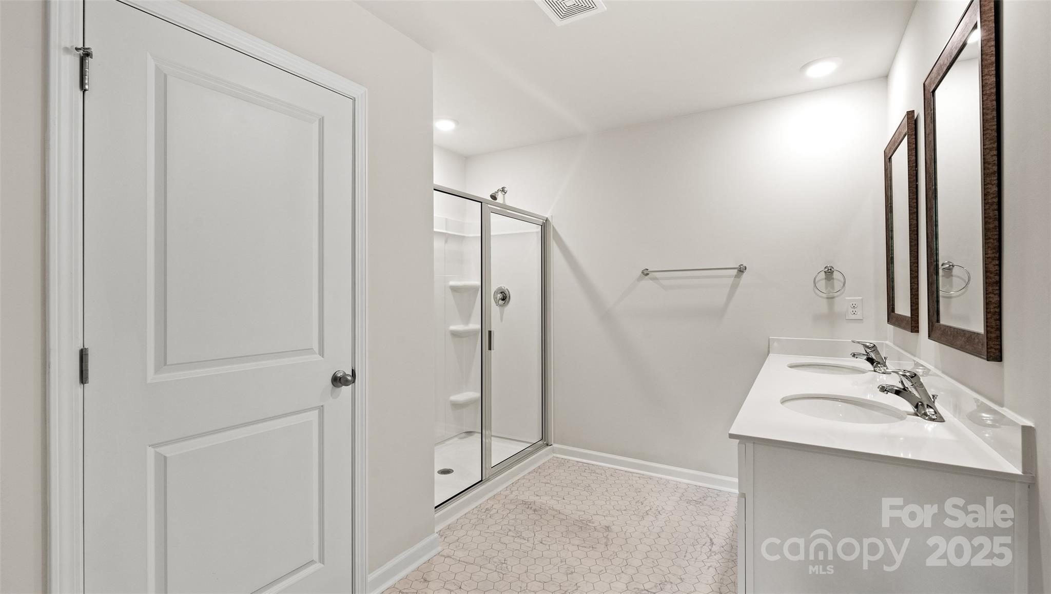 212 Callie River Clyde, NC 28721 - Photo 18 of 25 a bathroom with a sink and a mirror