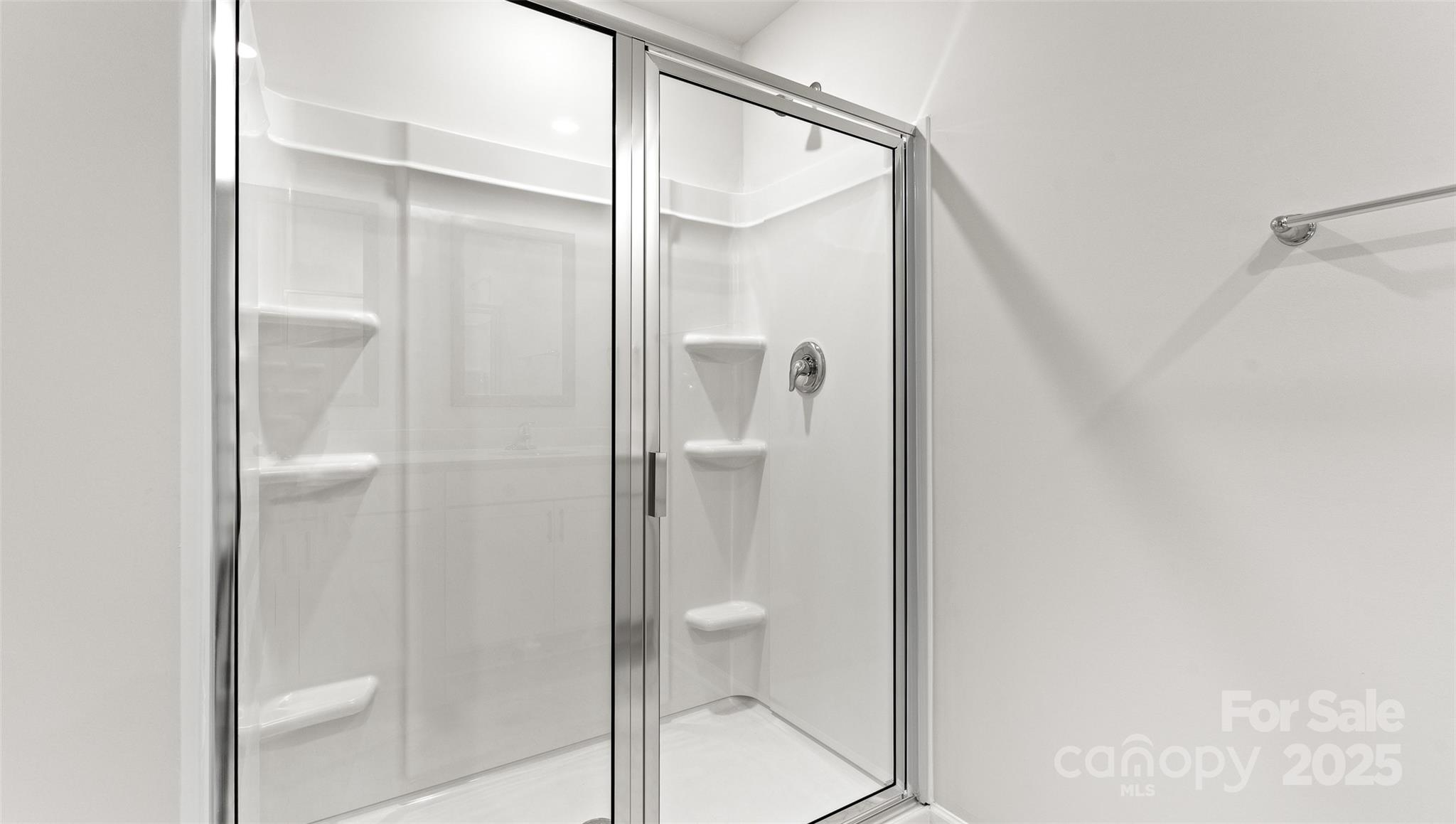 212 Callie River Clyde, NC 28721 - Photo 19 of 25 a bathroom with a shower and a toilet