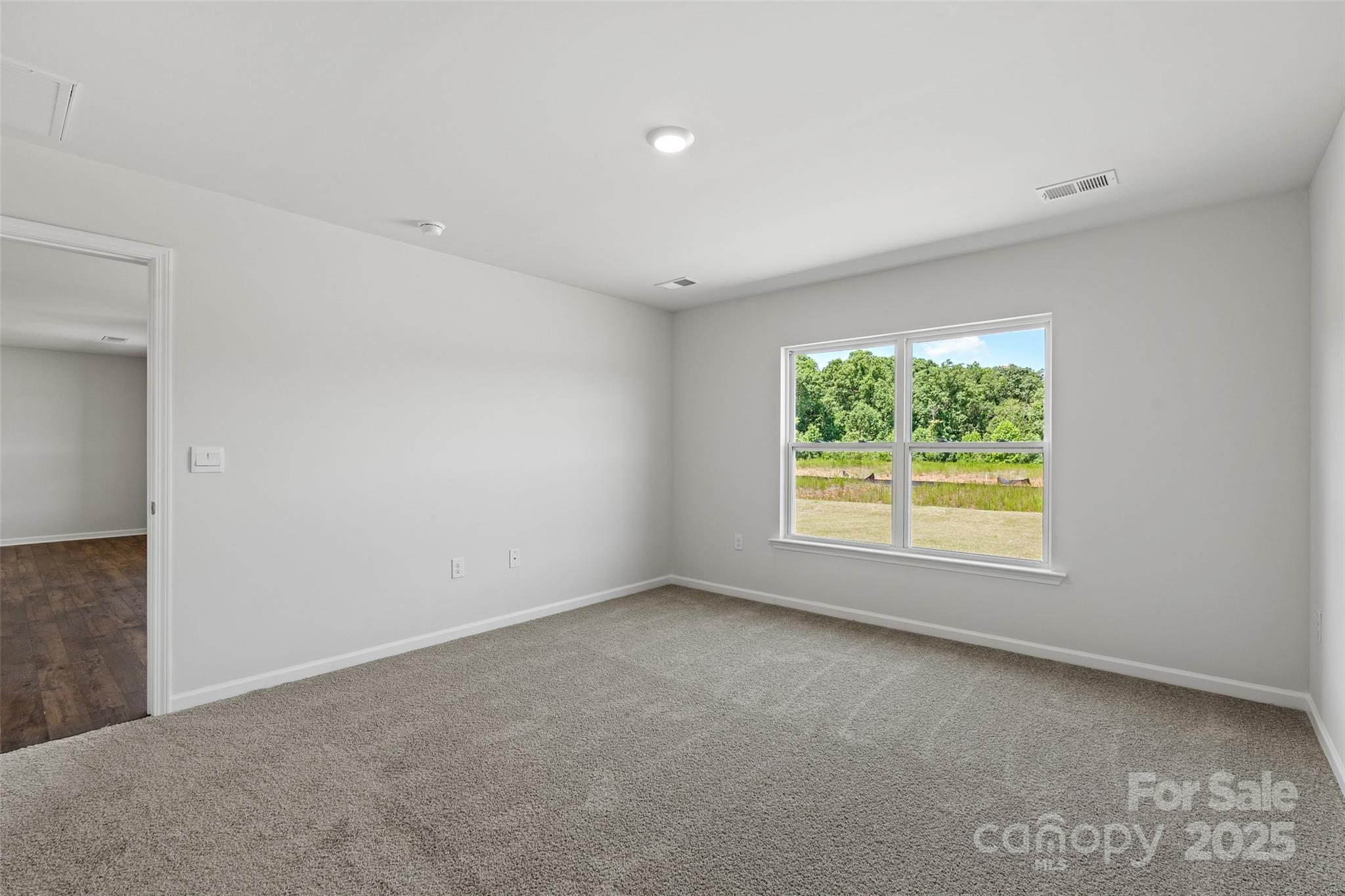 212 Callie River Clyde, NC 28721 - Photo 24 of 25 an empty room with a window