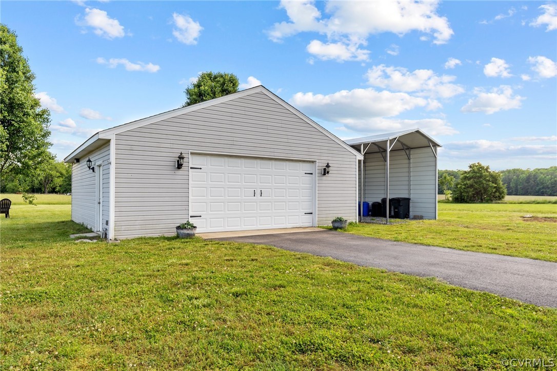 746 Mill Road King William, VA 23086 - Photo 6 of 48 2 car, oversized garage with workshop and electricity!