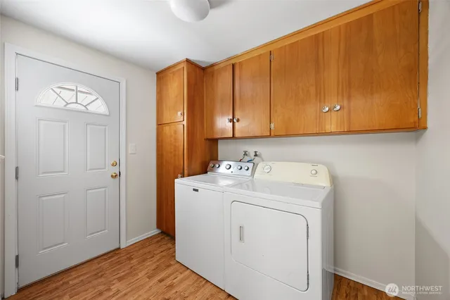 a view of a storage room with washer and dryer