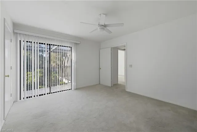 en empty room with windows