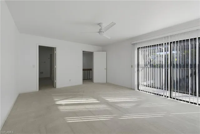 a view of a livingroom with a staircase