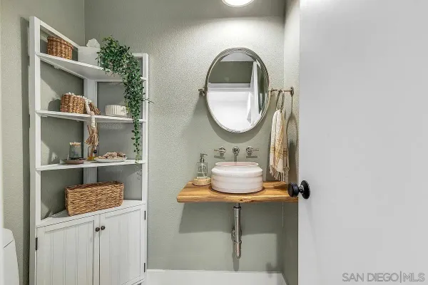 a view of a hallway with washer and dryer