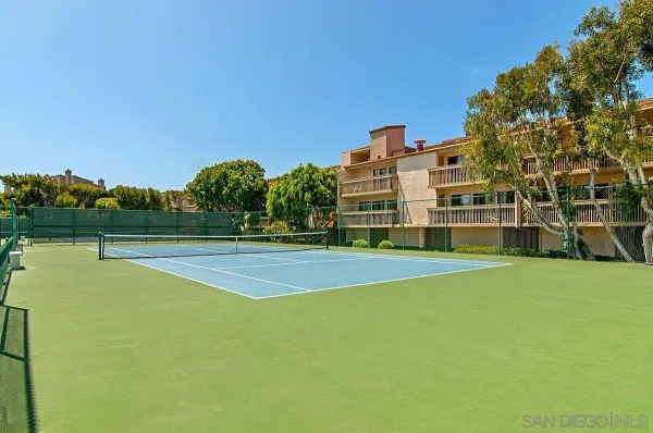 a view of a patio with swimming pool