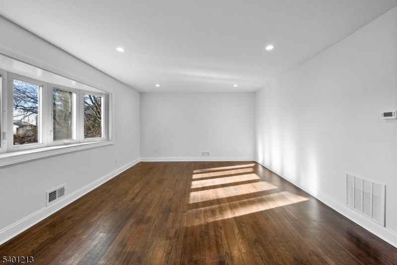 14 Harwich Road Flanders, NJ 07836 - Photo 11 of 34 a view of an empty room with wooden floor and windows