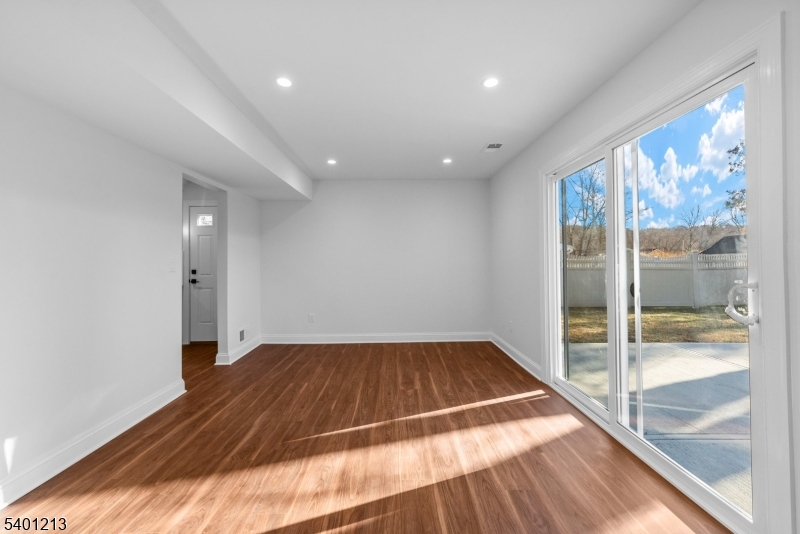 14 Harwich Road Flanders, NJ 07836 - Photo 13 of 34 a view of empty room with wooden floor and fan