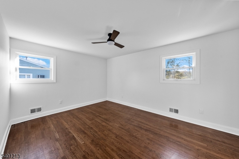 14 Harwich Road Flanders, NJ 07836 - Photo 22 of 34 a view of empty room with wooden floor and fan