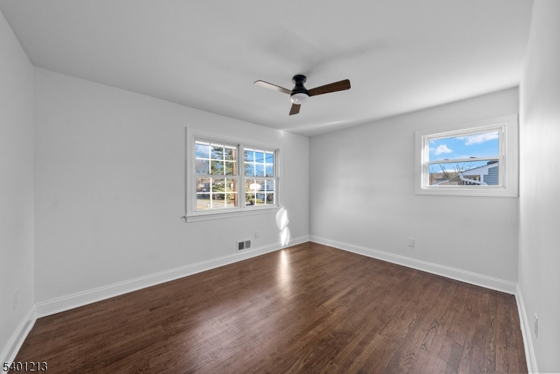 14 Harwich Road Flanders, NJ 07836 - Photo 25 of 34 a view of an empty room with wooden floor and a window
