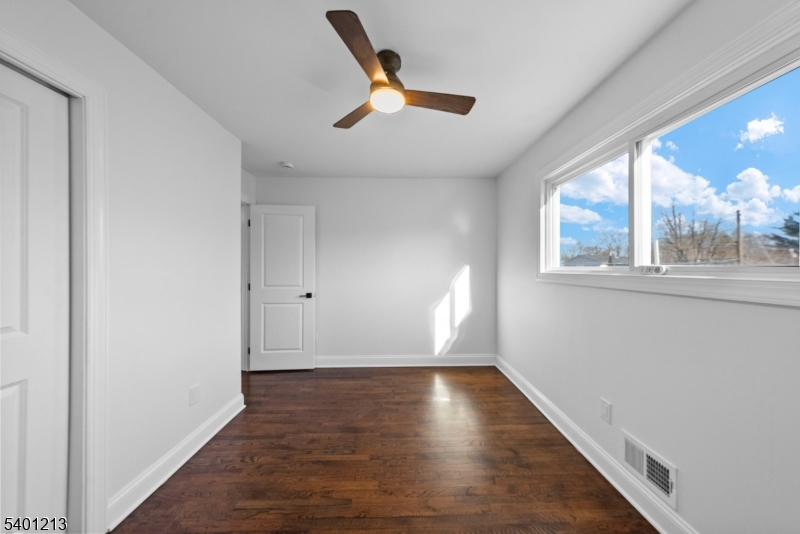 14 Harwich Road Flanders, NJ 07836 - Photo 26 of 34 a view of an empty room with wooden floor and a window