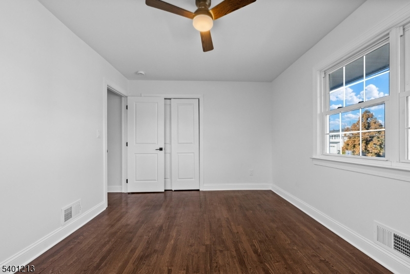14 Harwich Road Flanders, NJ 07836 - Photo 27 of 34 a view of an empty room with wooden floor and a window