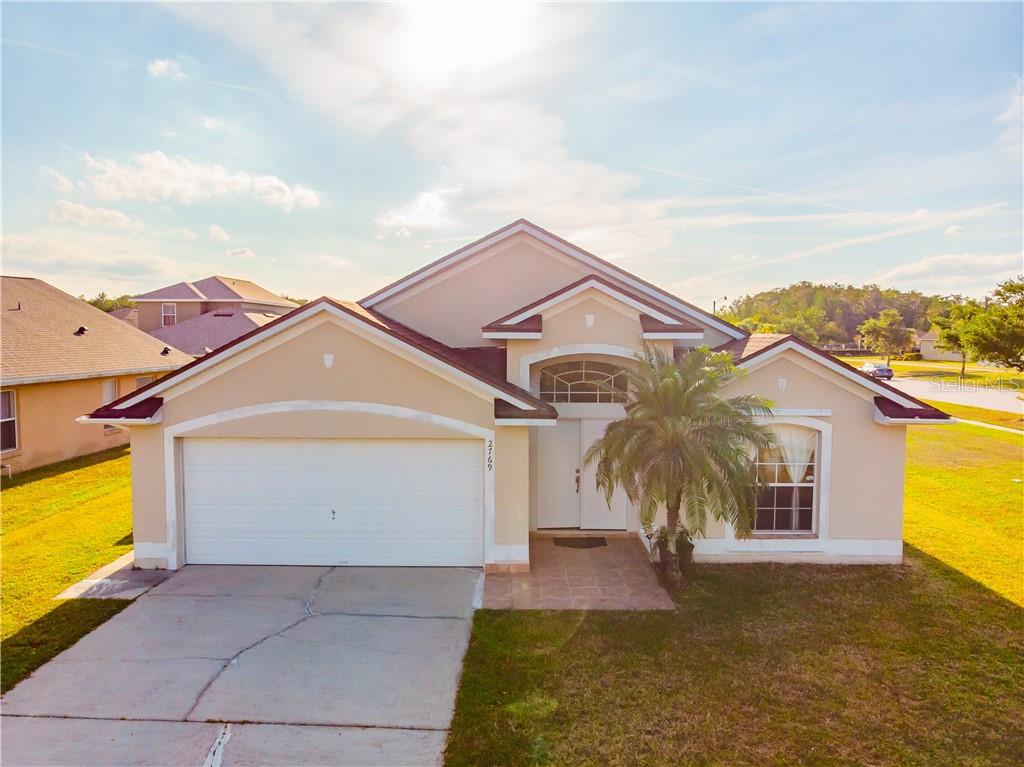 2769 Eagle Ridge Loop Kissimmee, FL 34746 - Photo 1 of 1 Front of this 4 bedroom Corner lot Home>
