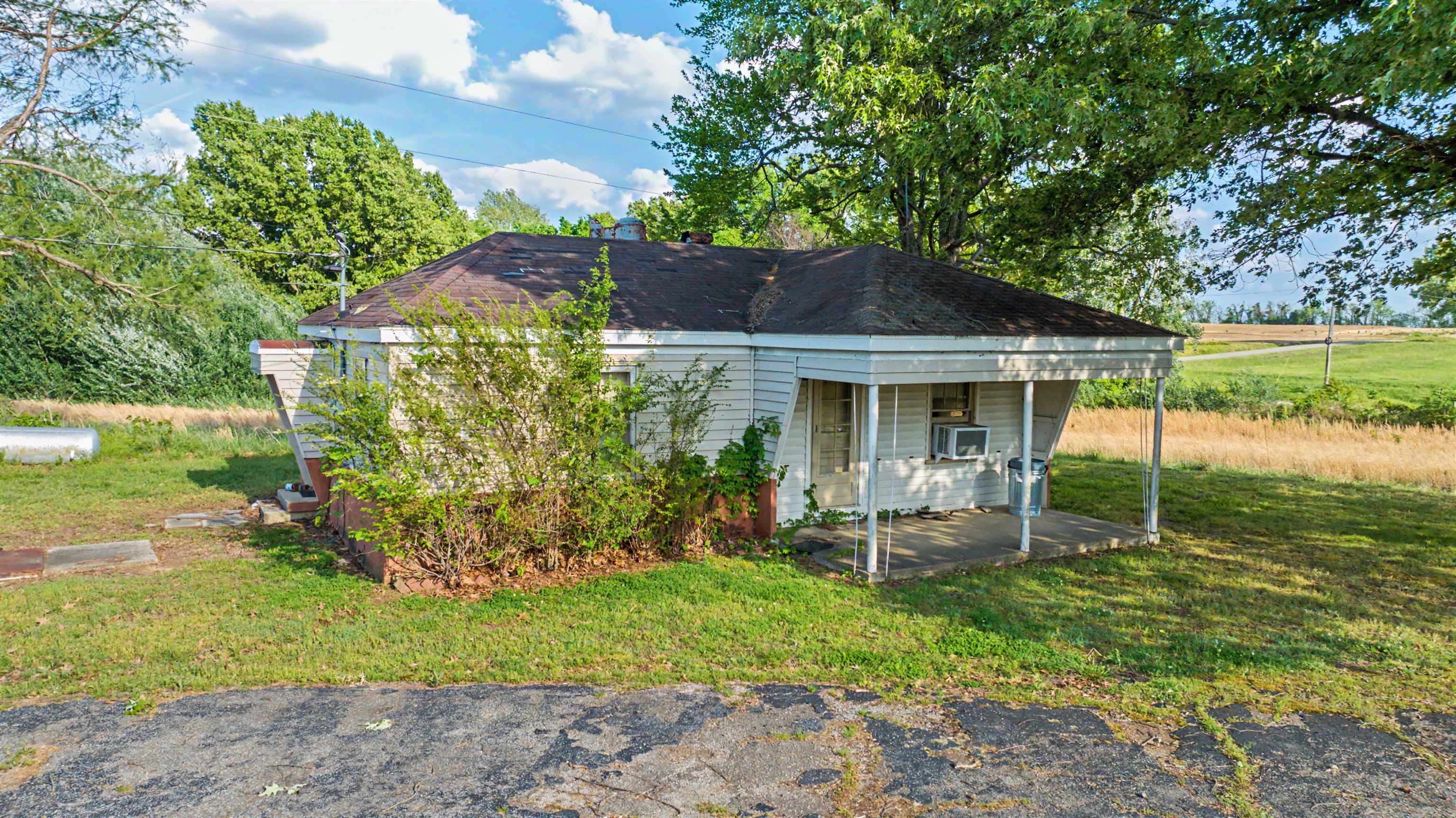 1632 Williams Road Alamo, TN 38001 - Photo 7 of 14 a front view of a house with garden