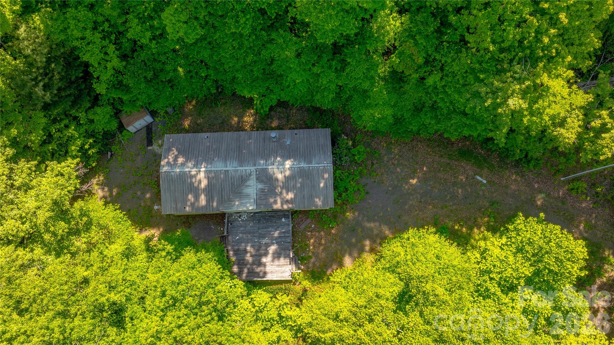 214 Ballard Creek Road Fairview, NC 28730 - Photo 3 of 18 an aerial view of a house with a yard