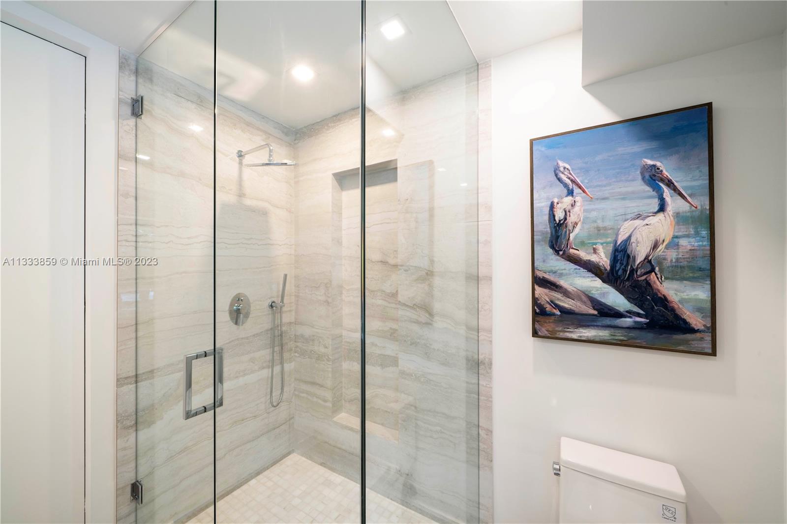 5334 Pine Tree Drive Miami Beach, FL 33140 - Photo 18 of 42 a bathroom with a shower