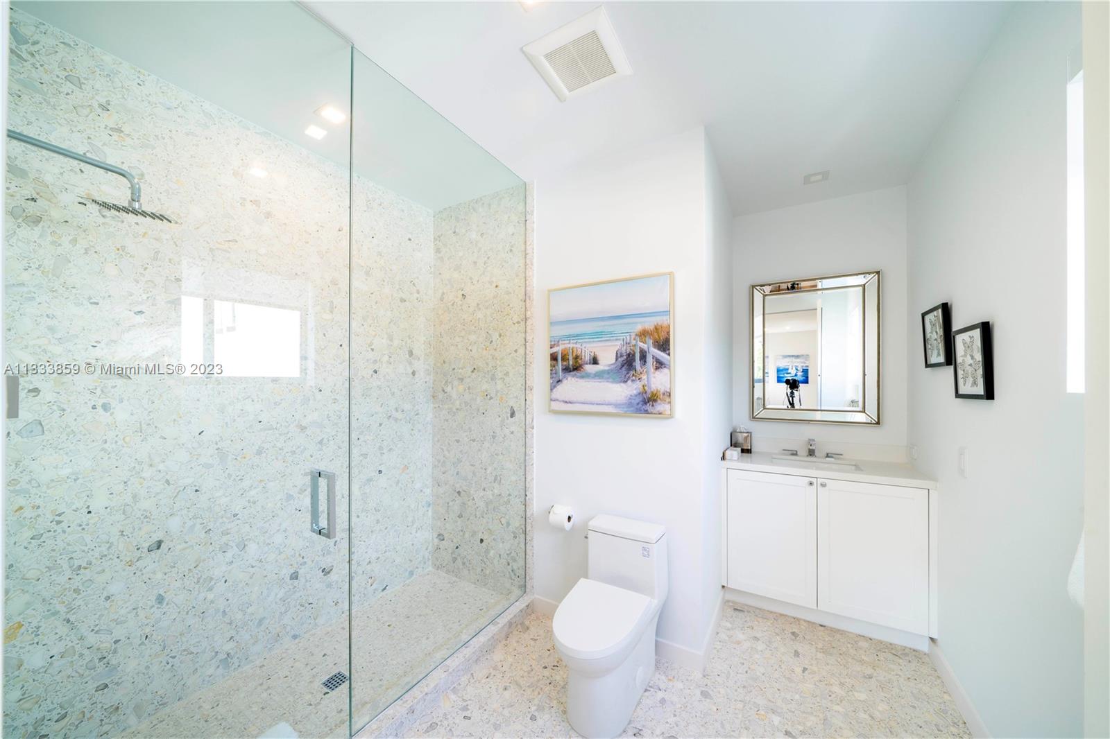 5334 Pine Tree Drive Miami Beach, FL 33140 - Photo 31 of 42 a bathroom with a sink toilet and shower