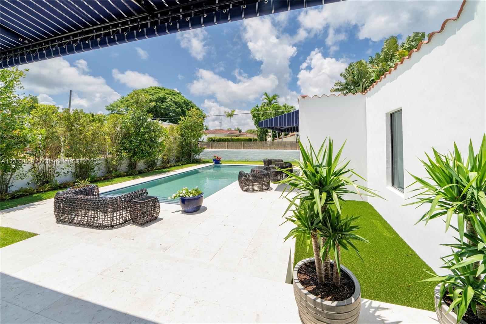 5334 Pine Tree Drive Miami Beach, FL 33140 - Photo 42 of 42 a view of fountain in the backyard of a house