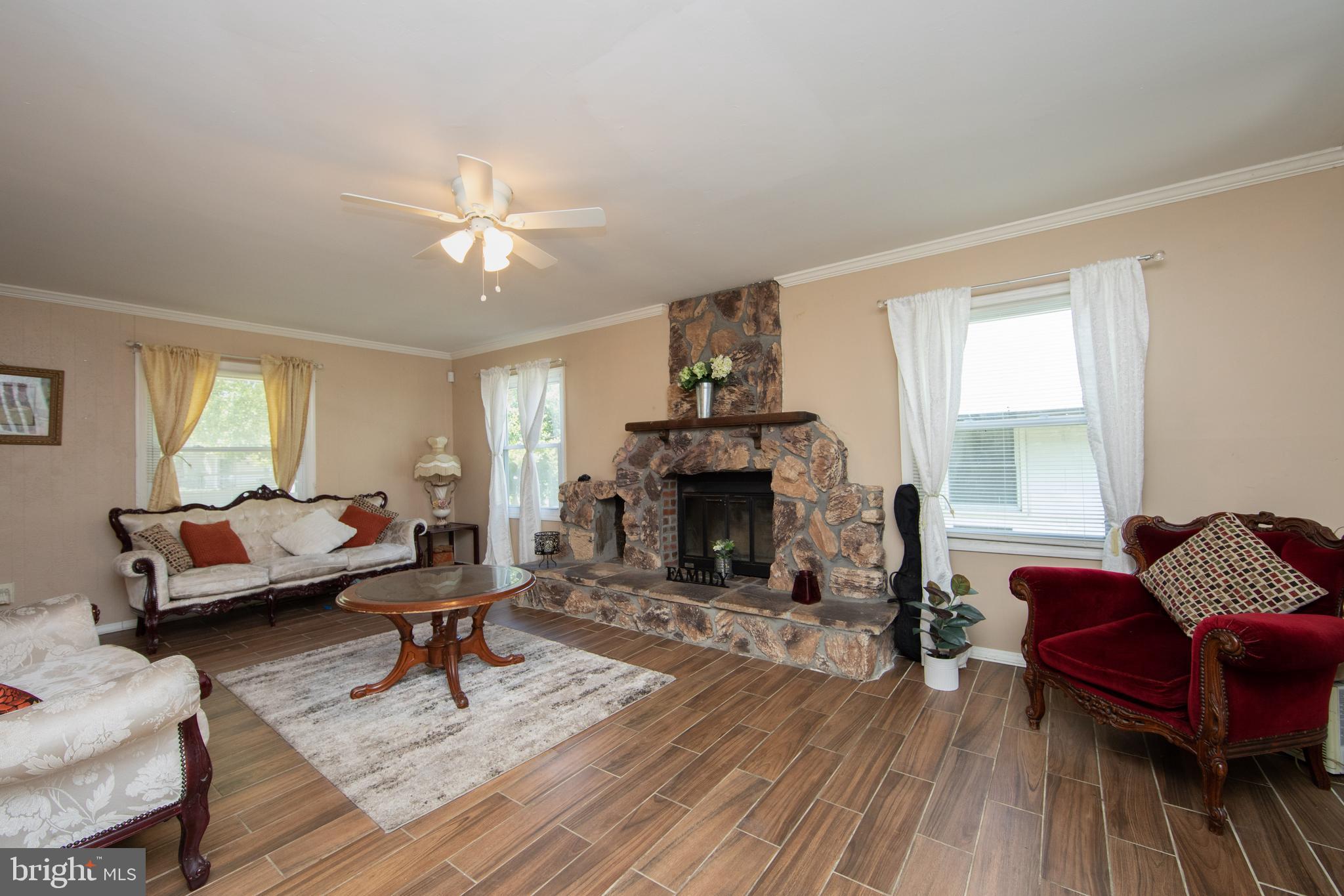 100 Pennypacker Drive Willingboro, NJ 08046 - Photo 3 of 24 living room with real wood fireplace