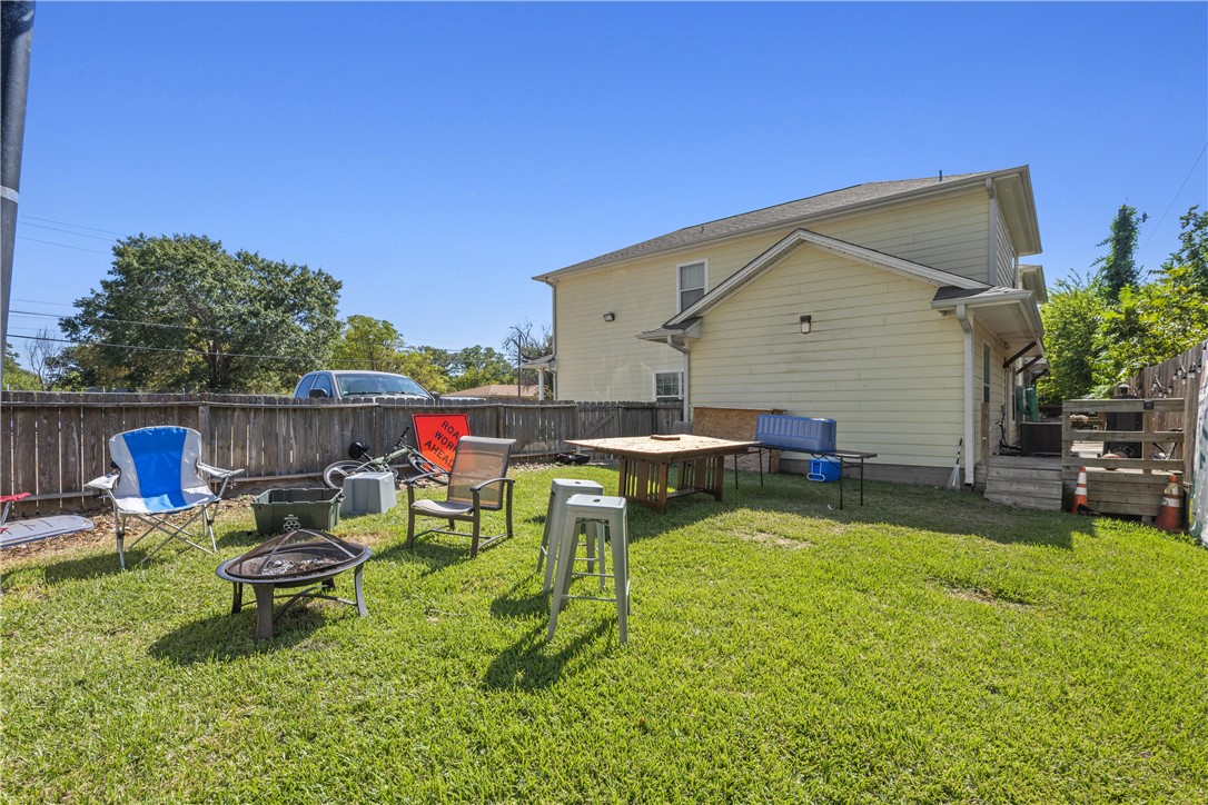 114 Lynn Drive Bryan, TX 77801 - Photo 5 of 31 a view of backyard with swimming pool and sitting area