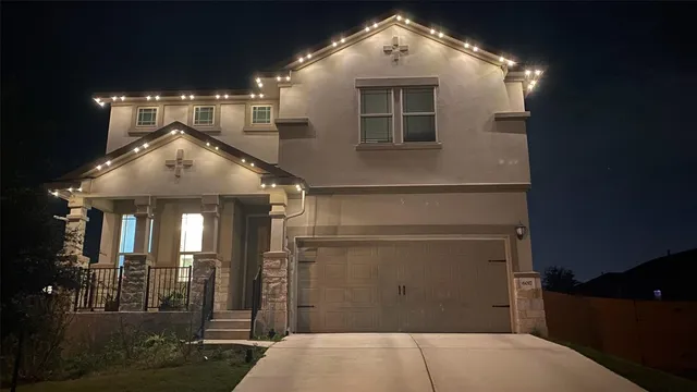 a view of a brick house with a outdoor space