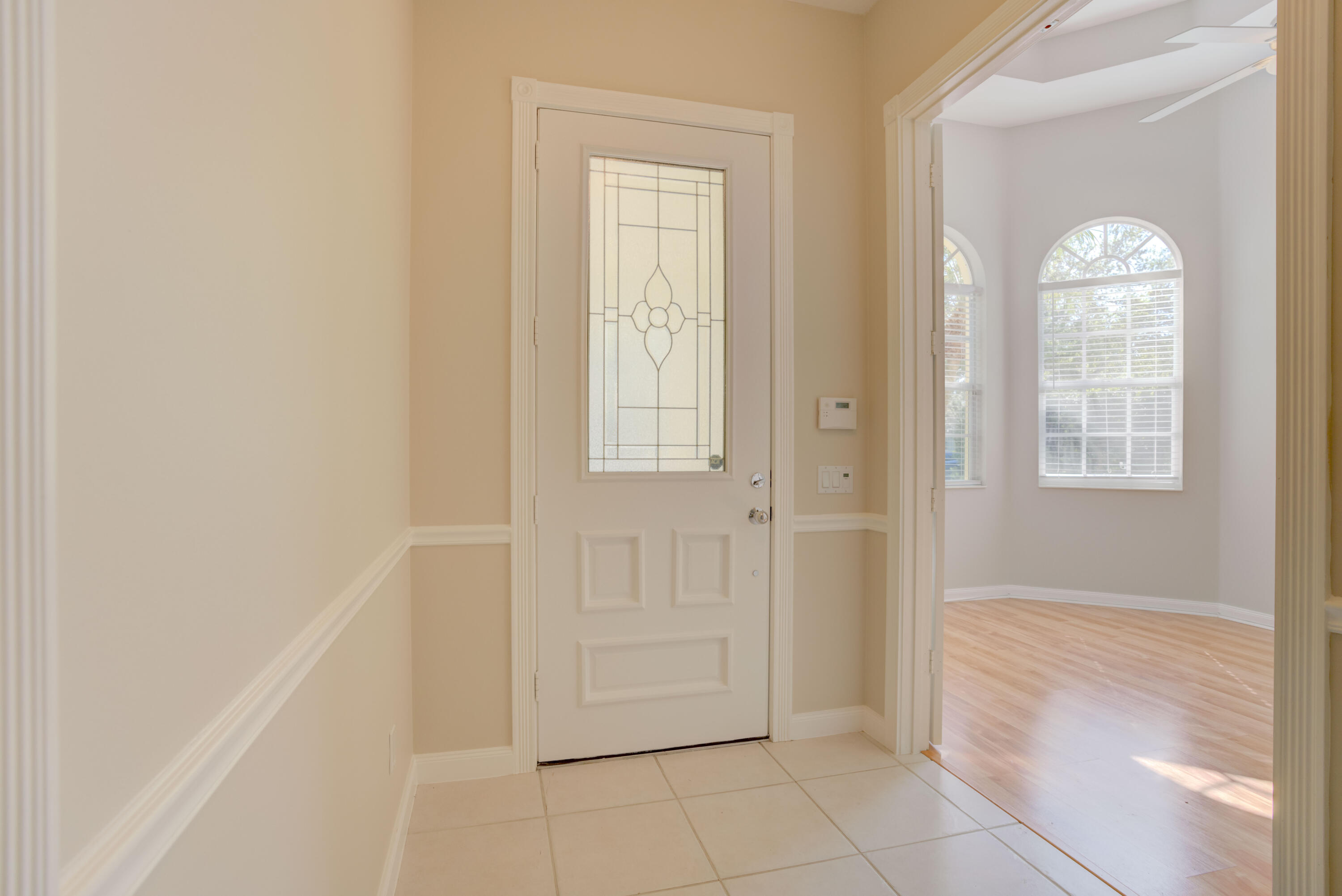 256 San Remo Drive Jupiter, FL 33458 - Photo 20 of 46 an empty room with windows