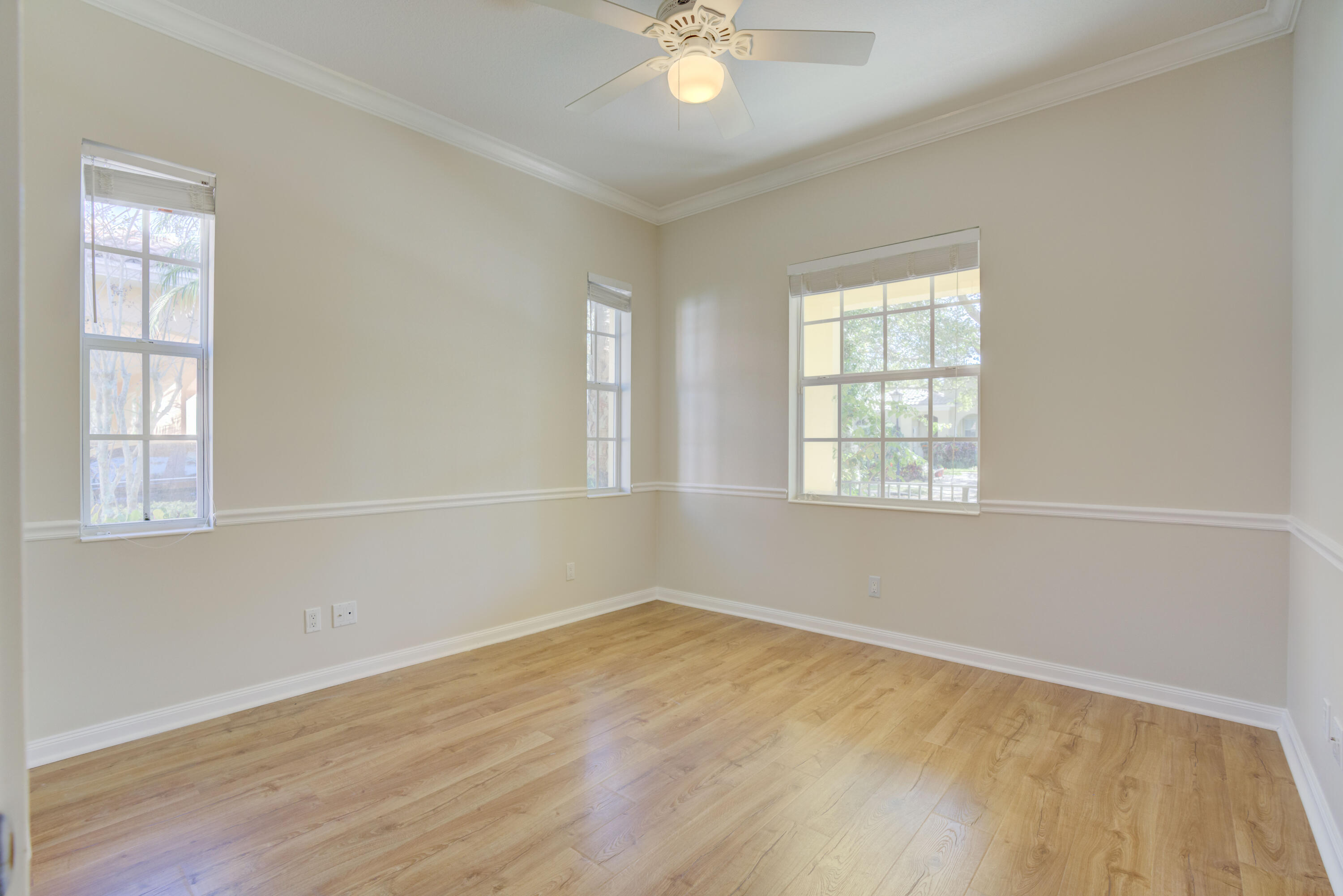 256 San Remo Drive Jupiter, FL 33458 - Photo 21 of 46 an empty room with a window