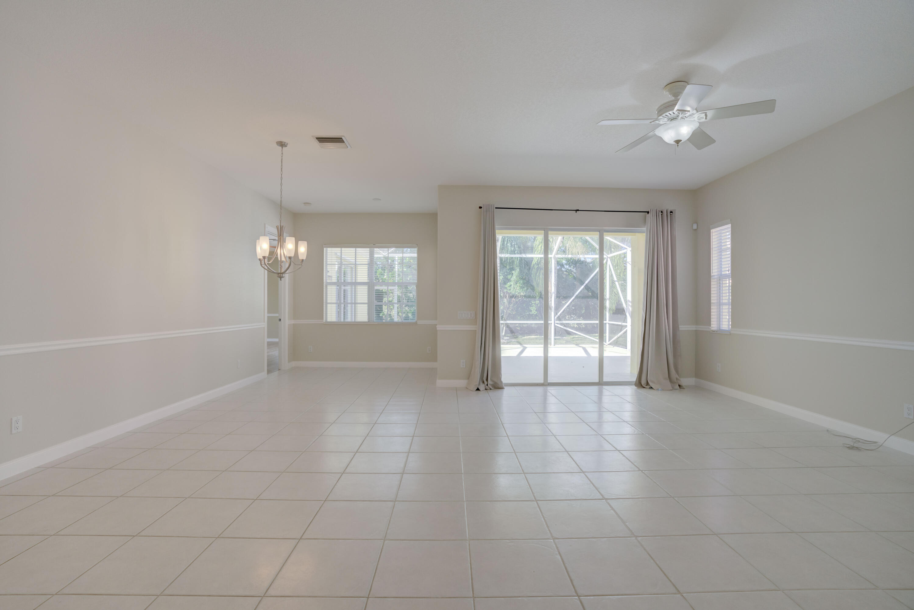 256 San Remo Drive Jupiter, FL 33458 - Photo 27 of 46 a view of an empty room with a window