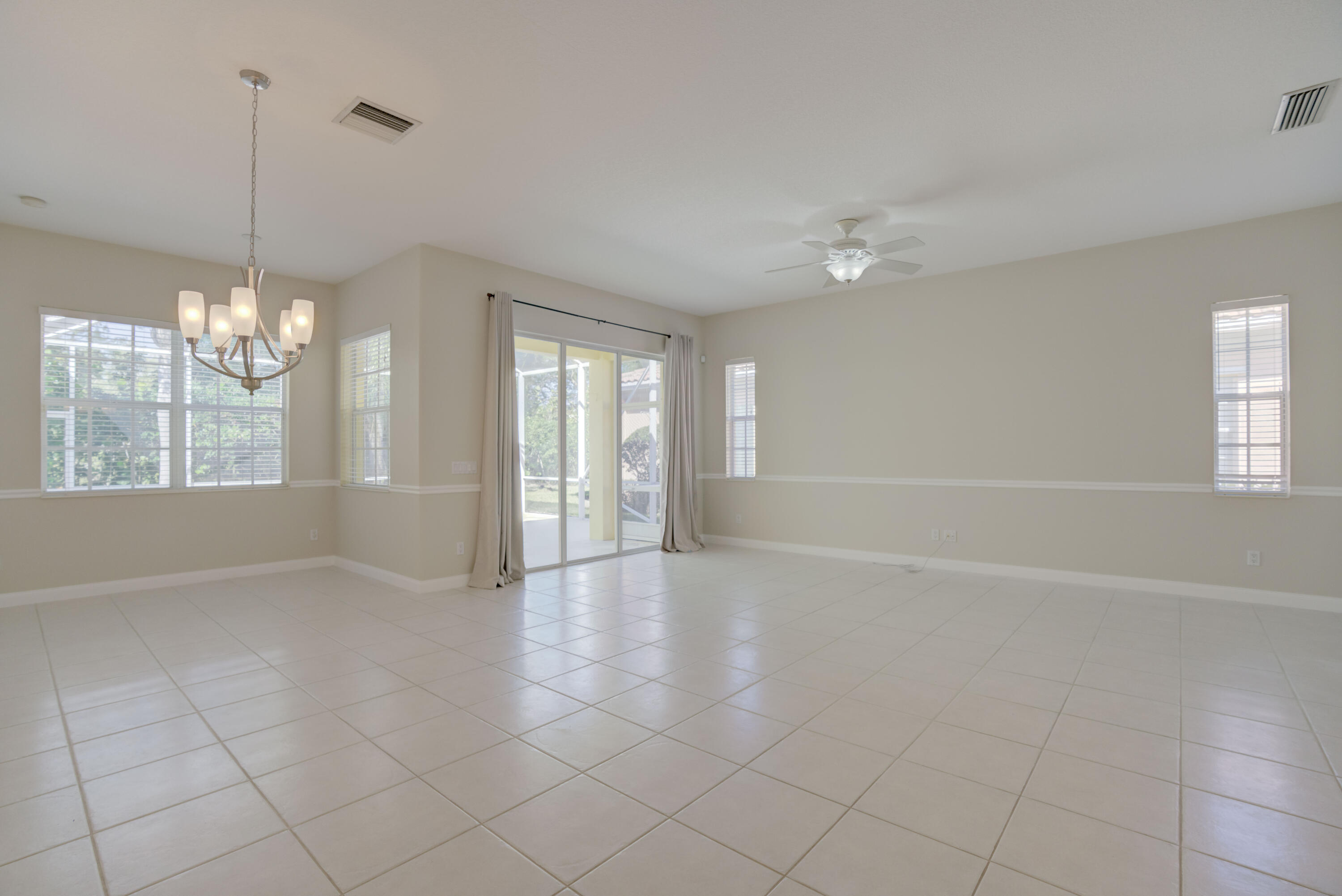 256 San Remo Drive Jupiter, FL 33458 - Photo 28 of 46 a view of an empty room with a window