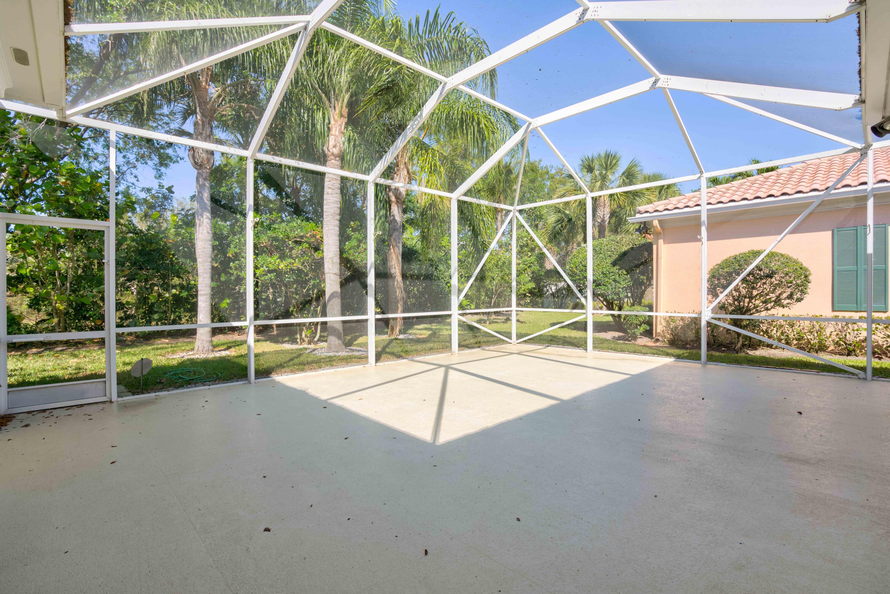 256 San Remo Drive Jupiter, FL 33458 - Photo 32 of 46 a view of an empty room with sliding glass door