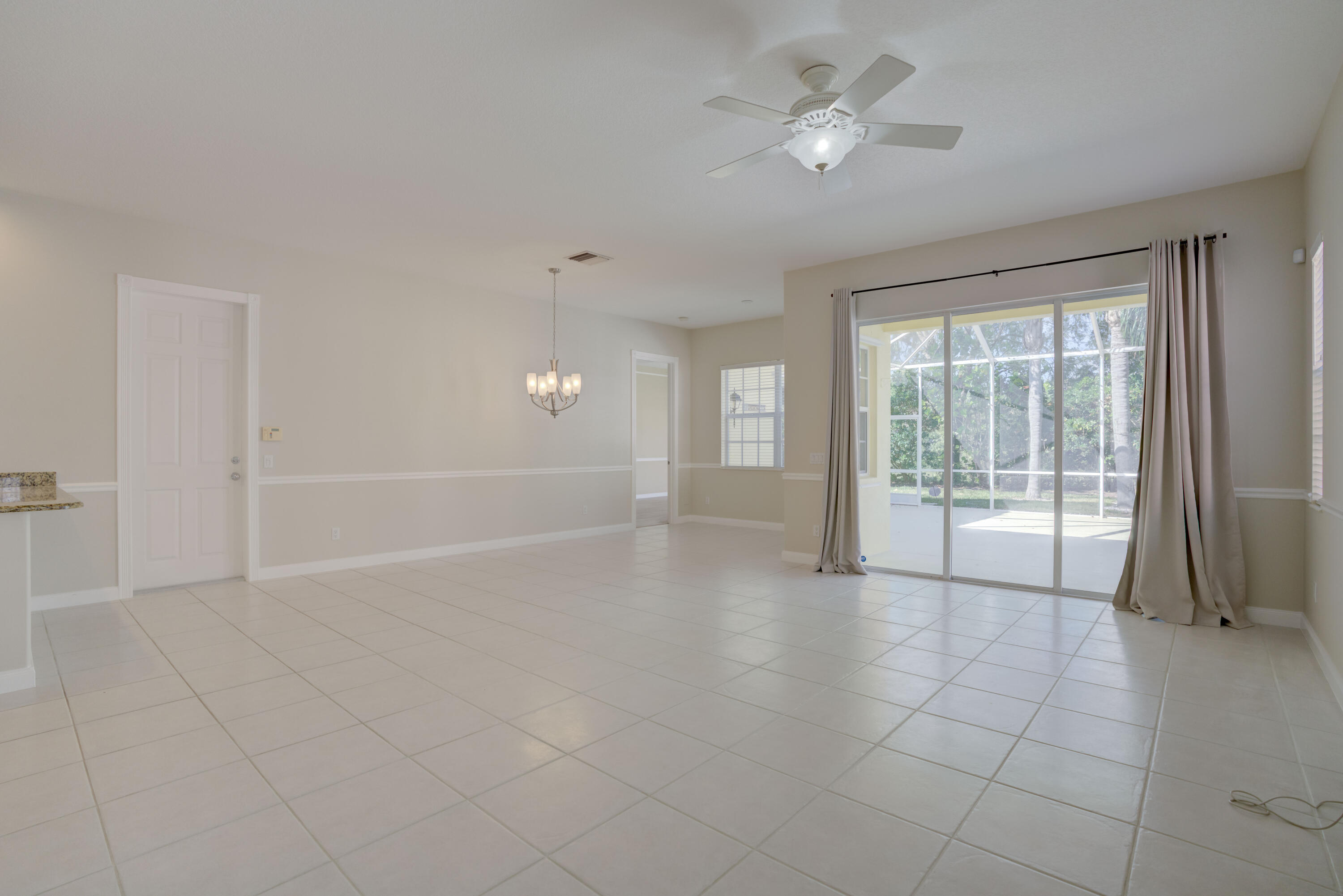 256 San Remo Drive Jupiter, FL 33458 - Photo 33 of 46 a view of an empty room with a window