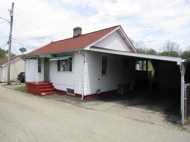 48 Locust Street Ellsworth, PA 15314 - Photo 1 of 26 a view of a house with a yard