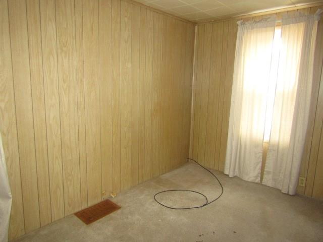 48 Locust Street Ellsworth, PA 15314 - Photo 11 of 26 a bathroom with a sink and a shower curtain