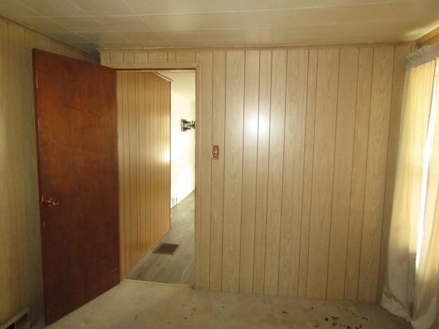 48 Locust Street Ellsworth, PA 15314 - Photo 12 of 26 a bathroom with a shower and a mirror