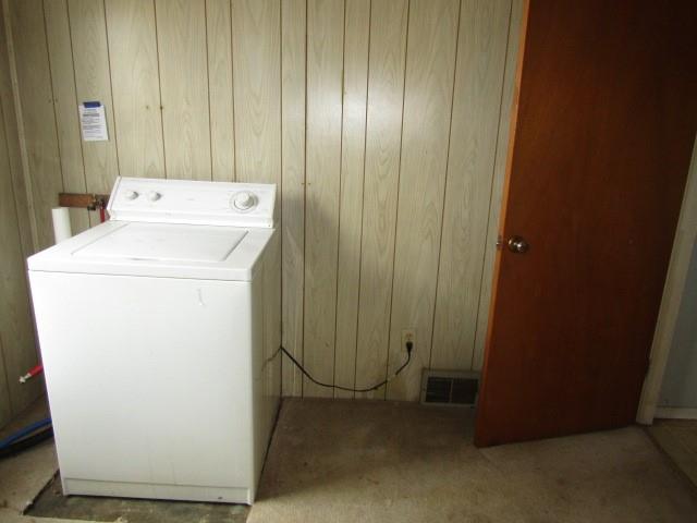 48 Locust Street Ellsworth, PA 15314 - Photo 19 of 26 a utility room with dryer and washer