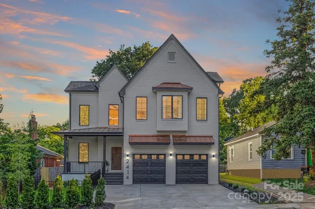 a view of house with a yard